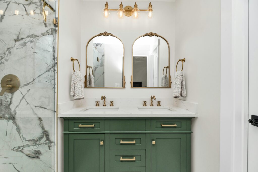 Refaced bathroom vanity cabinets with new doors, updated hardware, and a clean, modern design.