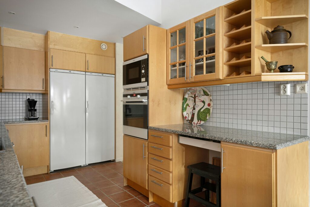 a newly completed kitchen cabinet refinishing project in Los Angeles, CA